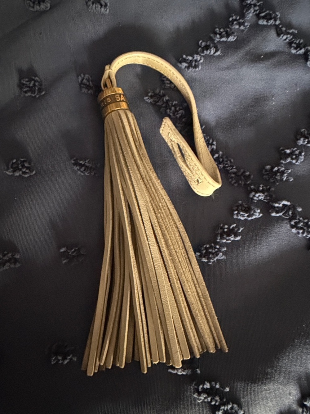 Yves Saint Laurent YSL Leather Tassel Keychain in Cream with Gold